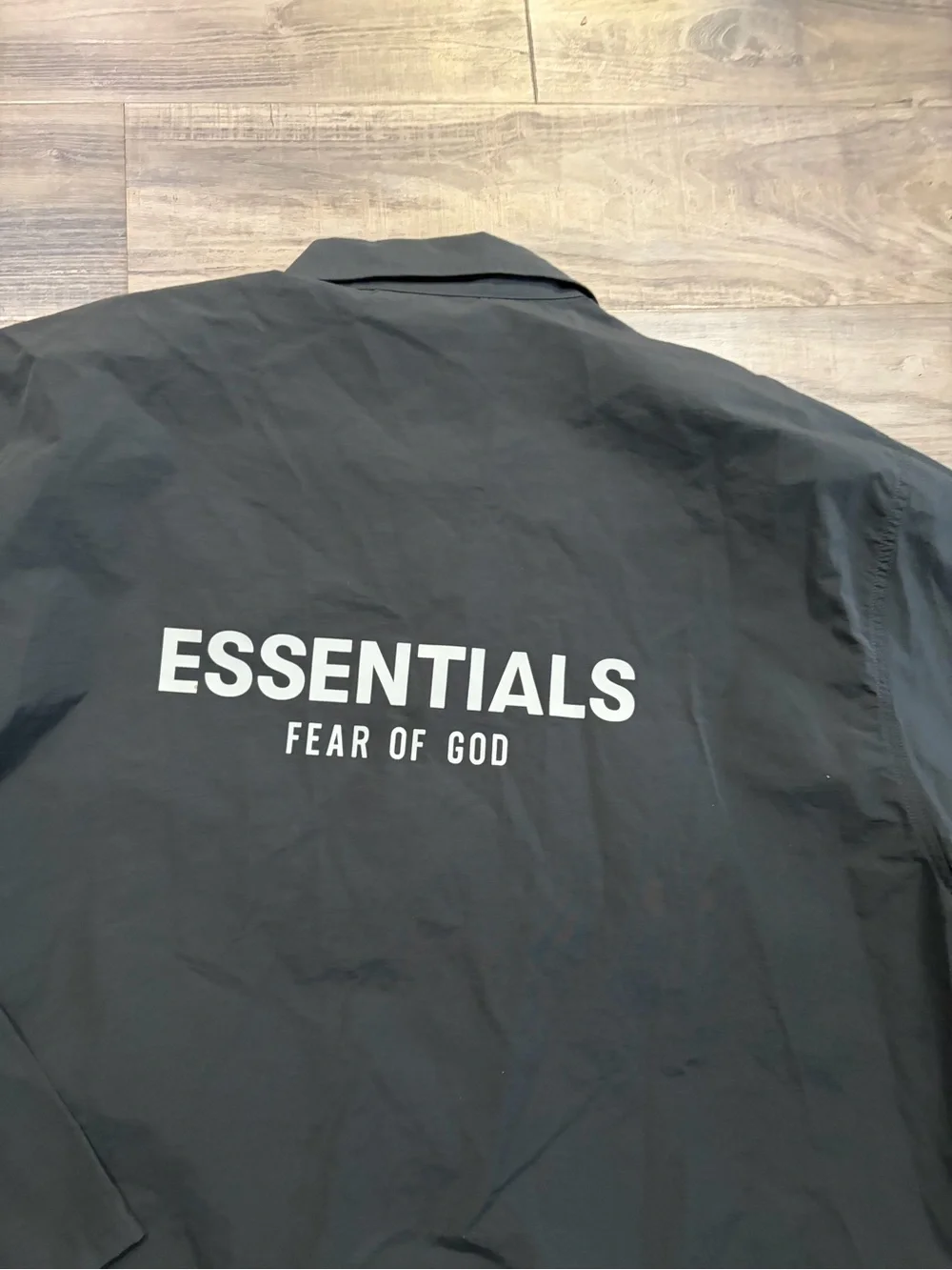 Fear of God Essentials BlacFear of God Essentials Black Nylon Windbreaker Jacket